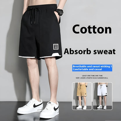 Cotton shorts for teenage boys in black, shown on a hanger, featuring a mid-waist design.