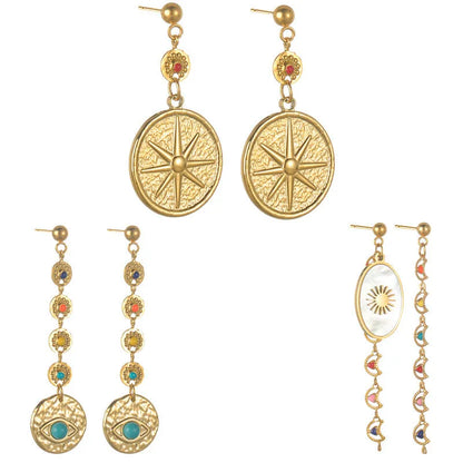Stainless steel geometric earrings in three design options: Eight Awn Star, Eye, and Shell Sun styles