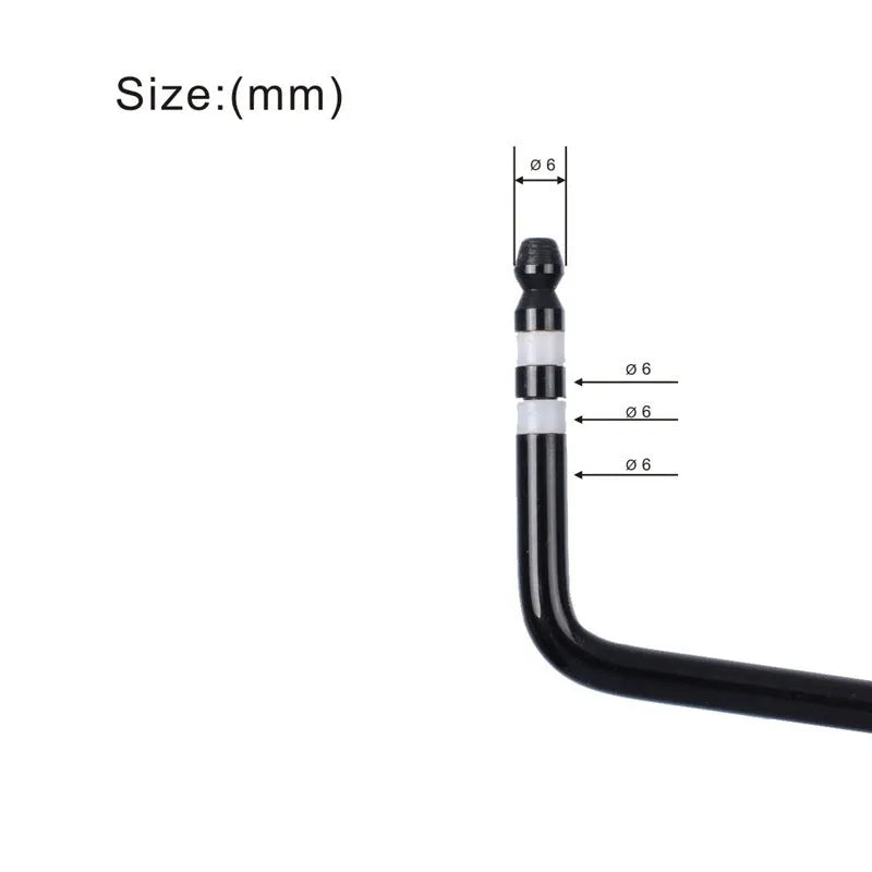 Close-up of a chrome guitar tremolo bar with direct plug-in threaded end.