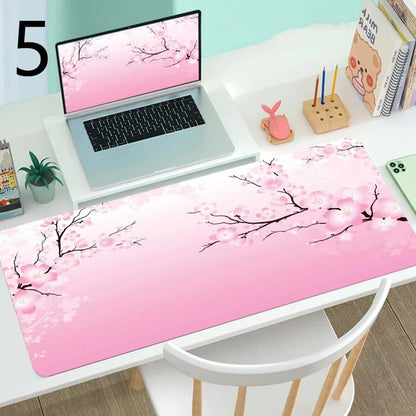 Large gaming mouse mat with printed design on rubber base, multiple size options from 300x600mm to 400x900mm