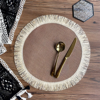 Round handwoven jute placemat with decorative tassels measuring 30cm diameter in Christmas green colour