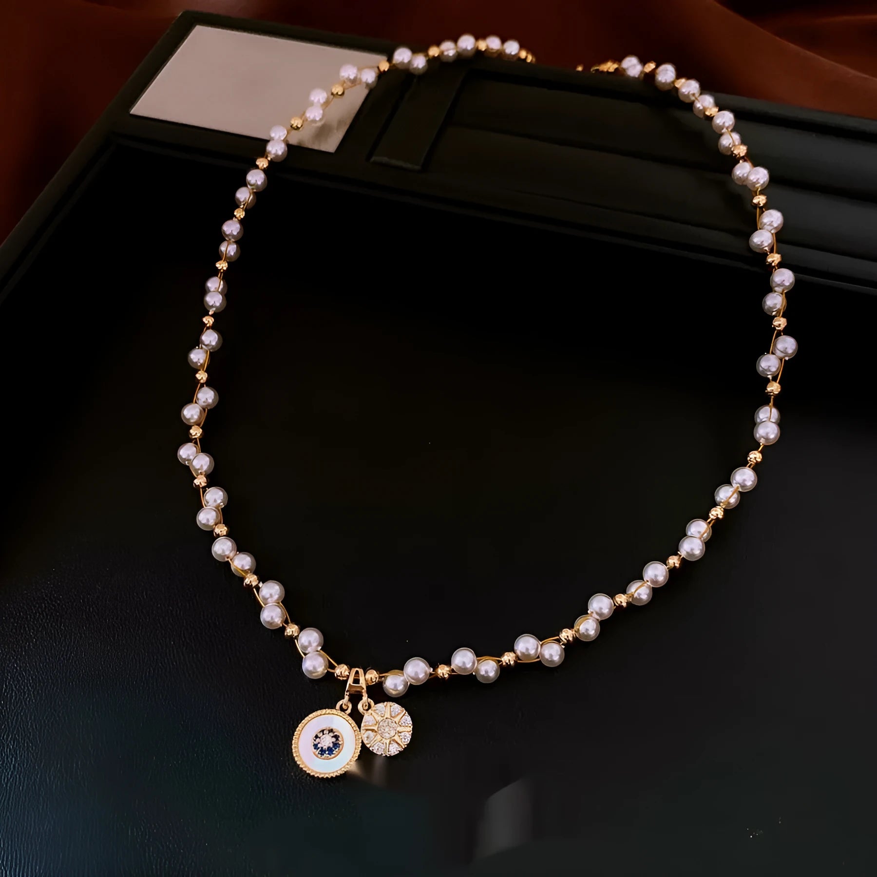 Gold-white necklace with round geometric pendant featuring zircon and imitation pearl on adjustable 41-50cm chain