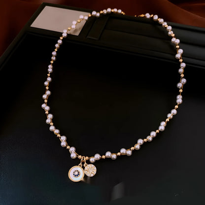 Gold-white necklace with round geometric pendant featuring zircon and imitation pearl on adjustable 41-50cm chain