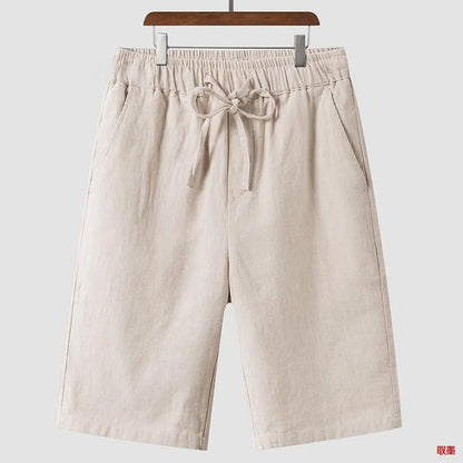 Men's linen casual shorts with elastic waistband in loose cropped design showing beige colour option