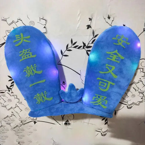 Rabbit ear ski helmet ornament with LED lighting and Velcro base attachment for helmet customisation