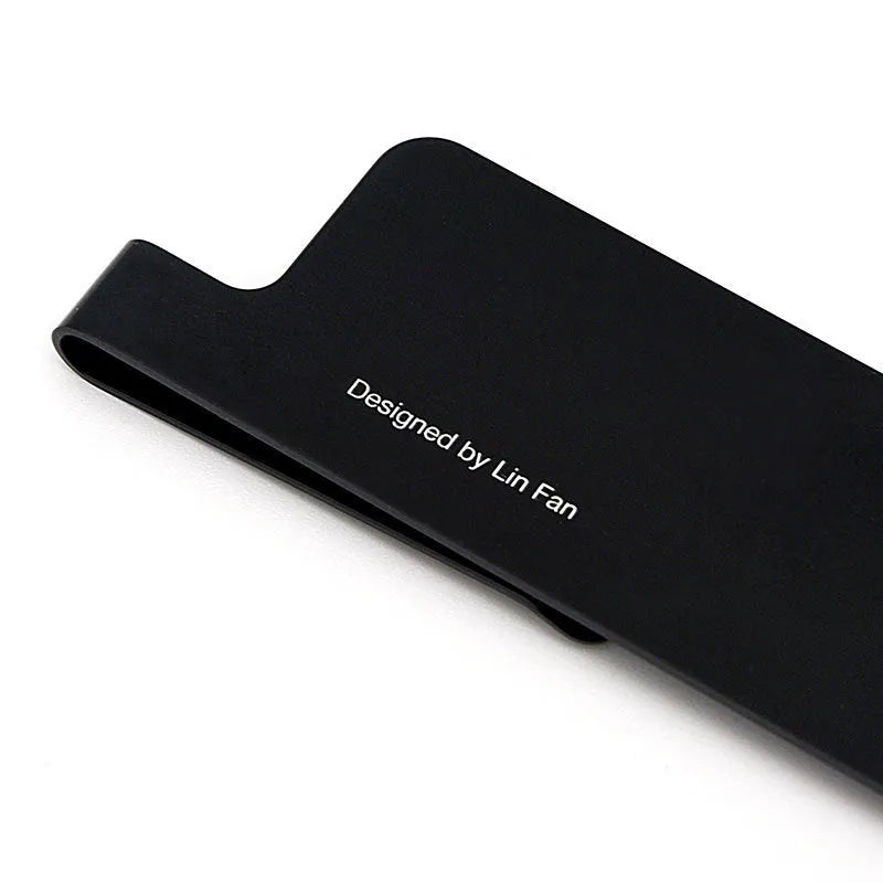 Aluminum bookmark ruler showing 15cm scale with laser-engraved markings in retro design