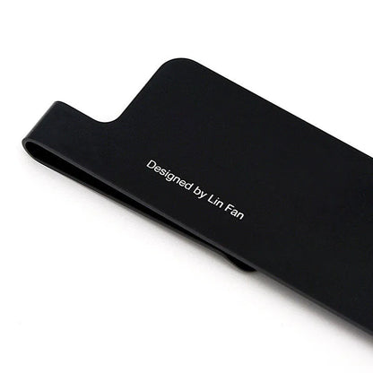 Aluminum bookmark ruler showing 15cm scale with laser-engraved markings in retro design