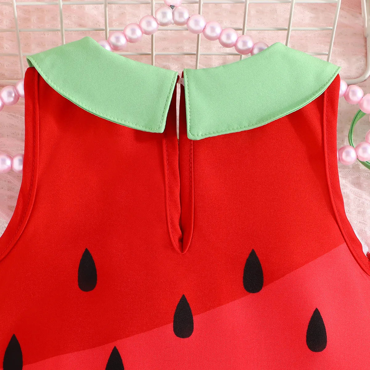 Girls sleeveless cartoon fruit print dress in colour QCQ40031AM, polyester fibre, sizes 6-9M to 2-3Y
