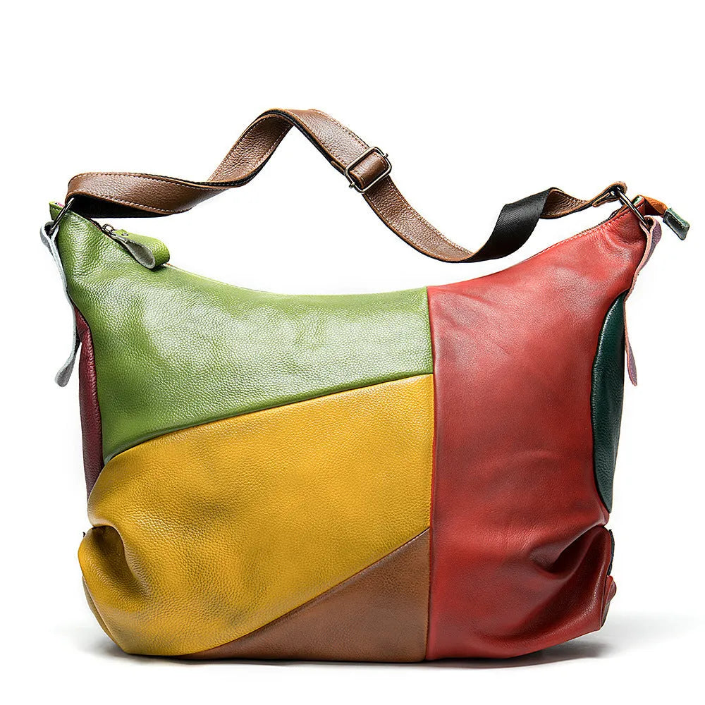 Cowhide leather crossbody bag showing its size, suitable for carrying a 15-inch laptop and A4 documents.