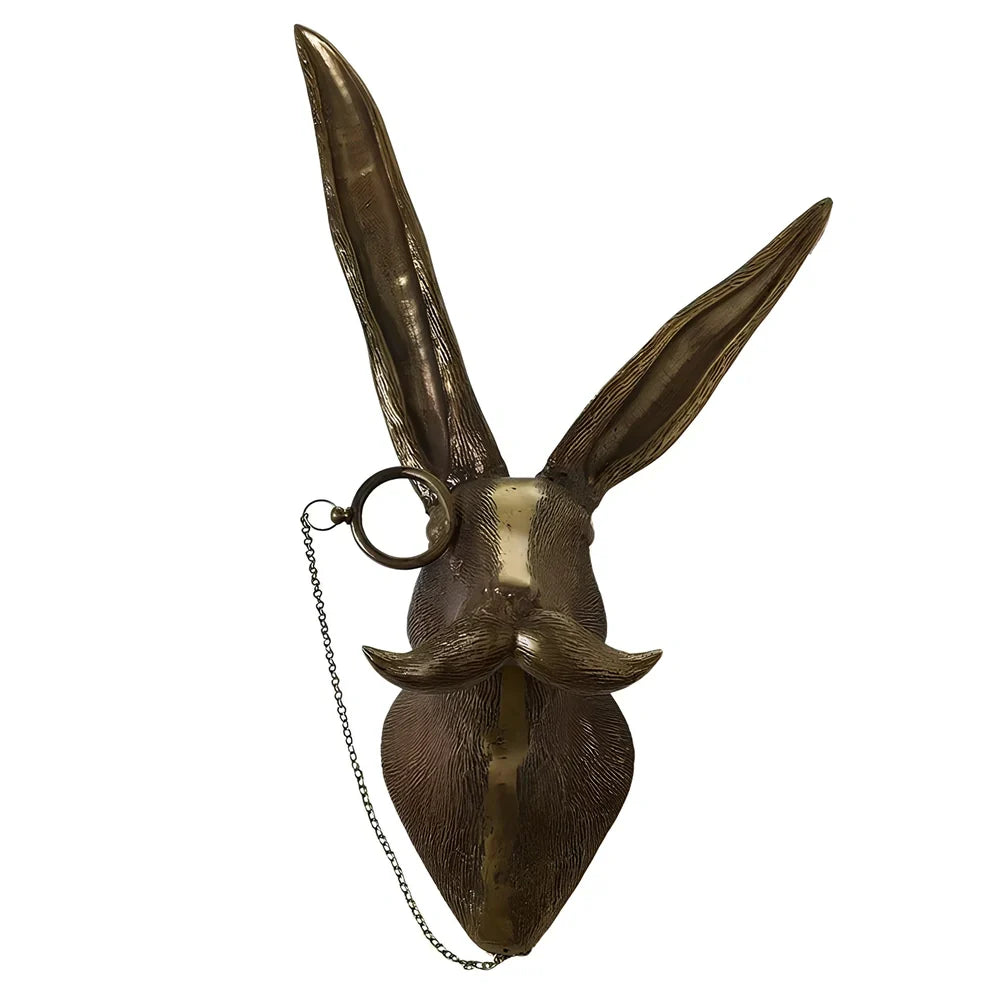 Antique bronze animal pendant showing bear design with synthetic resin construction