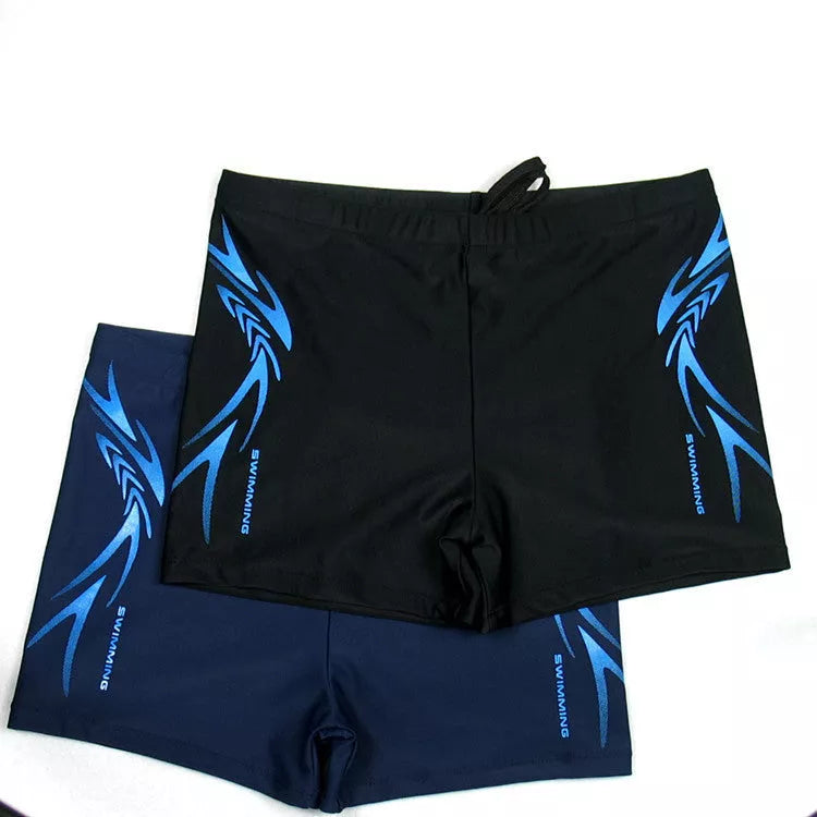 Men's boxer swimming trunks in dark blue and black, featuring quick-dry lining and stretch fabric