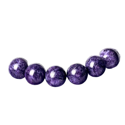 Natural transparent charoite crystal bracelet with platinum setting, available in 6mm, 8mm, 10mm, and 12mm bead sizes