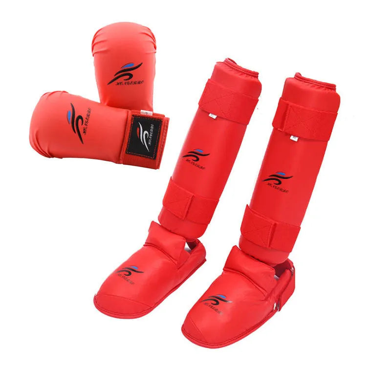 Red and blue karate protective gear set showing helmet, boxing gloves, and leg guard.