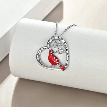 Elegant heart-shaped cardinal pendant necklace perfect for anniversaries and Valentine's Day gifts.