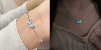 Glow-in-the-dark blue butterfly necklace and bracelet set for women, perfect for parties and gifts.