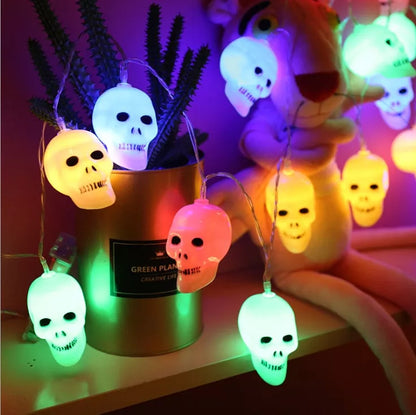 Battery-powered LED skeleton skull string lights for Halloween decor with durable plastic construction