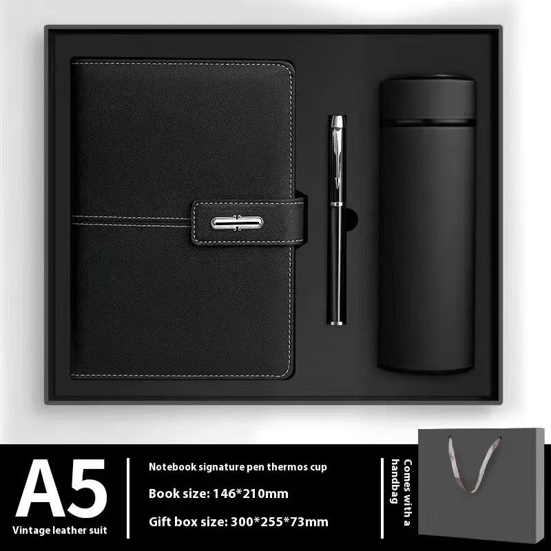 A5 notebook with imitation leather cover in a choice of colours including black, red, green, blue, and orange.