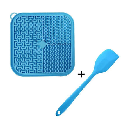 Orange, grey, blue, and green silicone dog licking mat with textured surface and suction cups