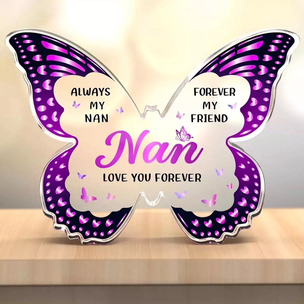 Butterfly-shaped acrylic keepsake with purple wing patterns and personalized message