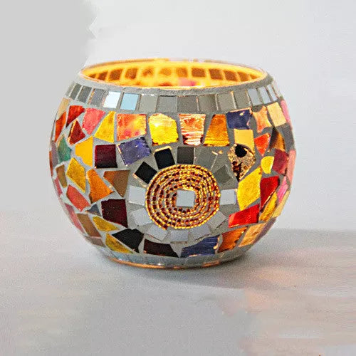 Mosaic glass candle holder in vibrant colors with elegant mosaic pattern