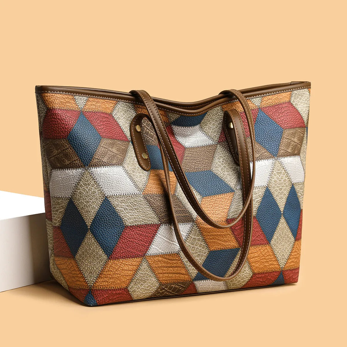 Women's PVC shoulder handbag in blue brown colour with sandwich pocket organisation