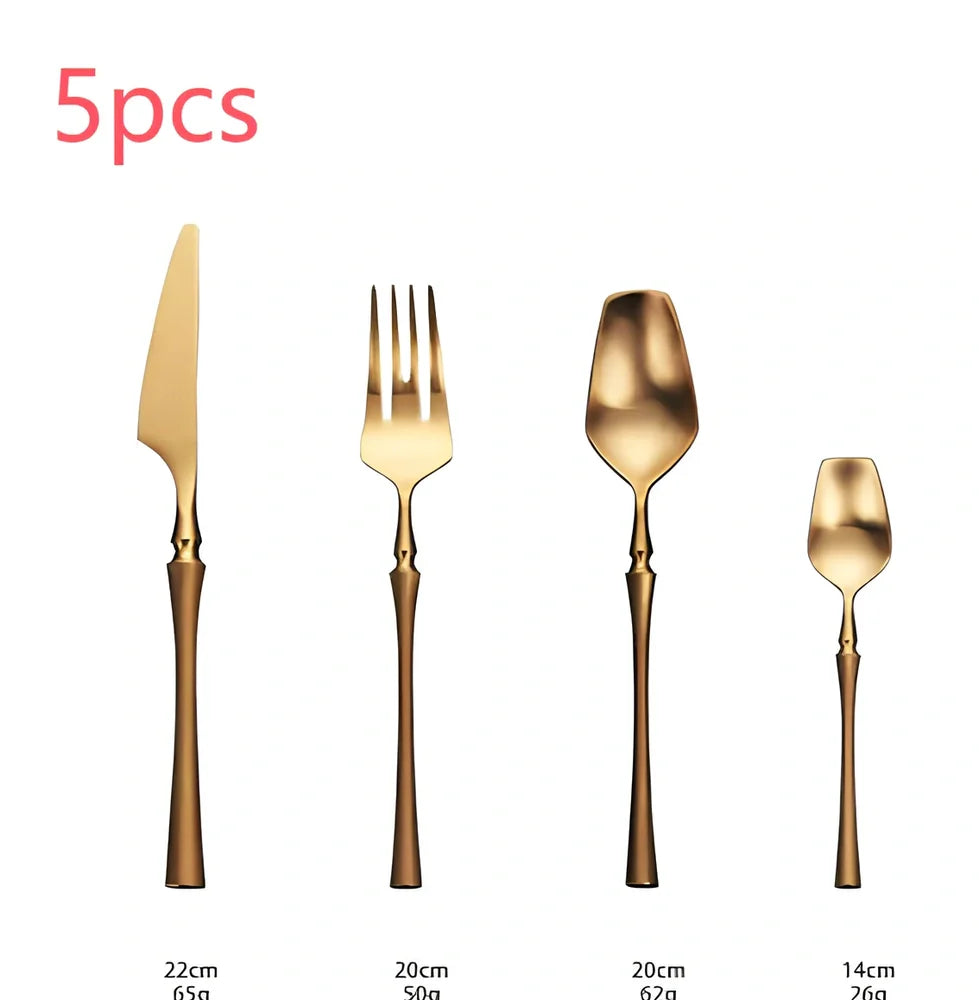 Four-piece stainless steel cutlery set showing main knife, fork, spoon, and teaspoon with mirror finish