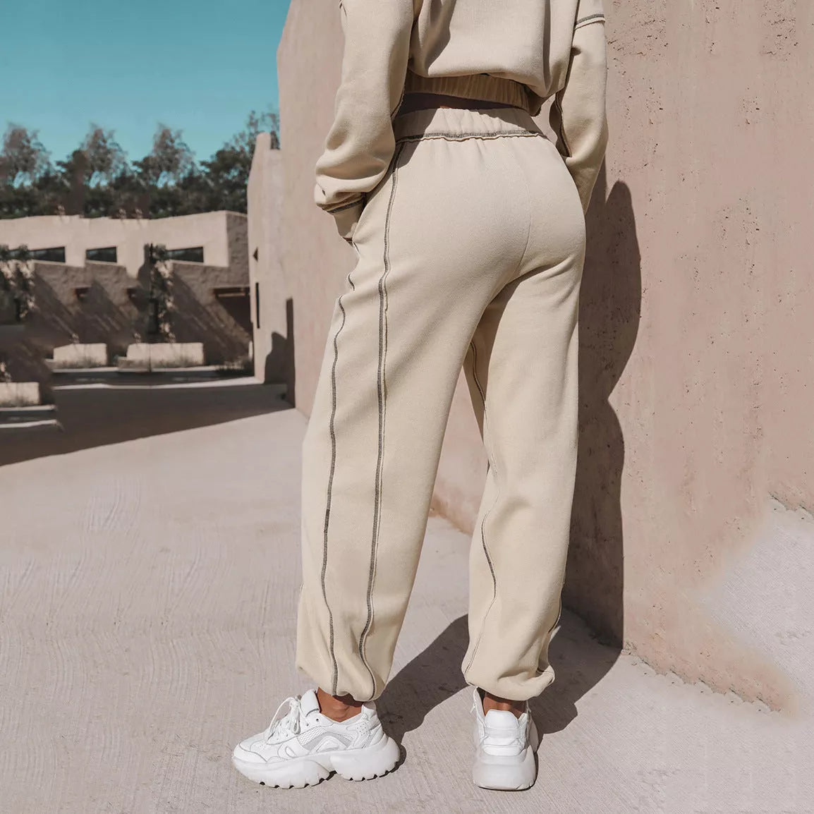 Women's long sleeve turtleneck sweatshirt with stand-up zipper and loose straight leg pants set