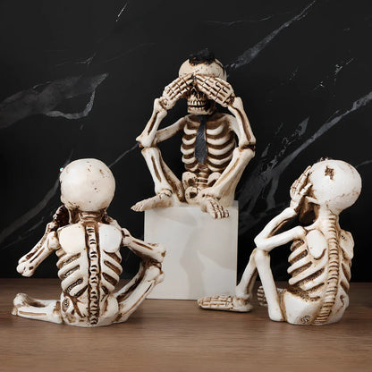 Resin Halloween three-piece set featuring ghost, skeleton don't listen, and don't look figures, 10-15 cm tall in photo colour
