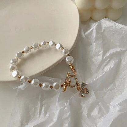 Elegant natural stone and pearl bracelet with a dazzling pendant design, perfect for enhancing any outfit