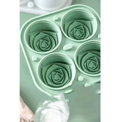 Orange silicone ice mould with 2.5-inch rose shapes and built-in filling funnel
