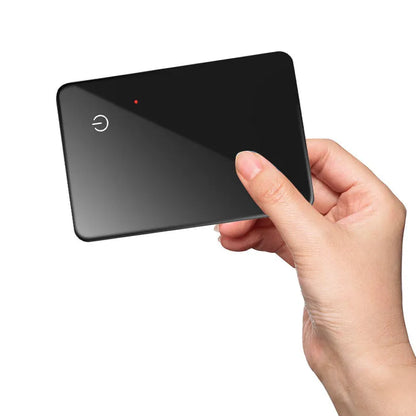 Black pet tracking device with wireless charging and NFC connectivity measuring 85mm