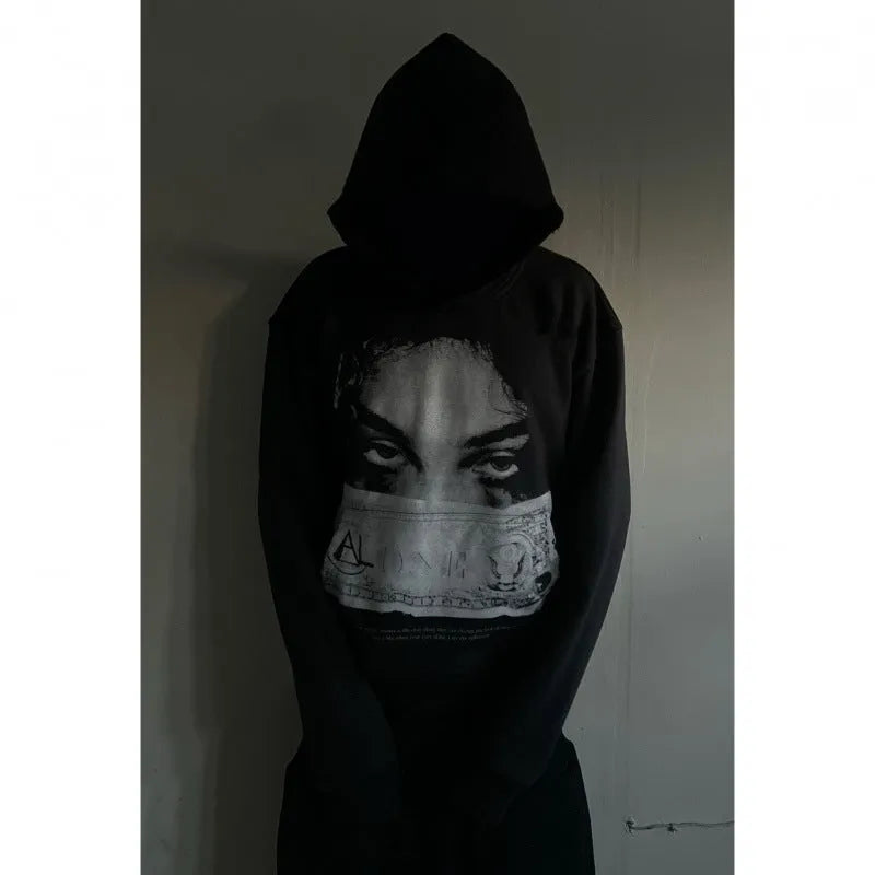 Black women's hoodie with cartoon print design in loose fit polyester construction