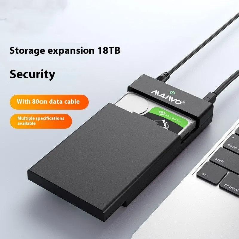 Black and silver 3.5-inch SATA hard disk enclosure with slide-open cover, USB 3.0 cable, and power adapter.