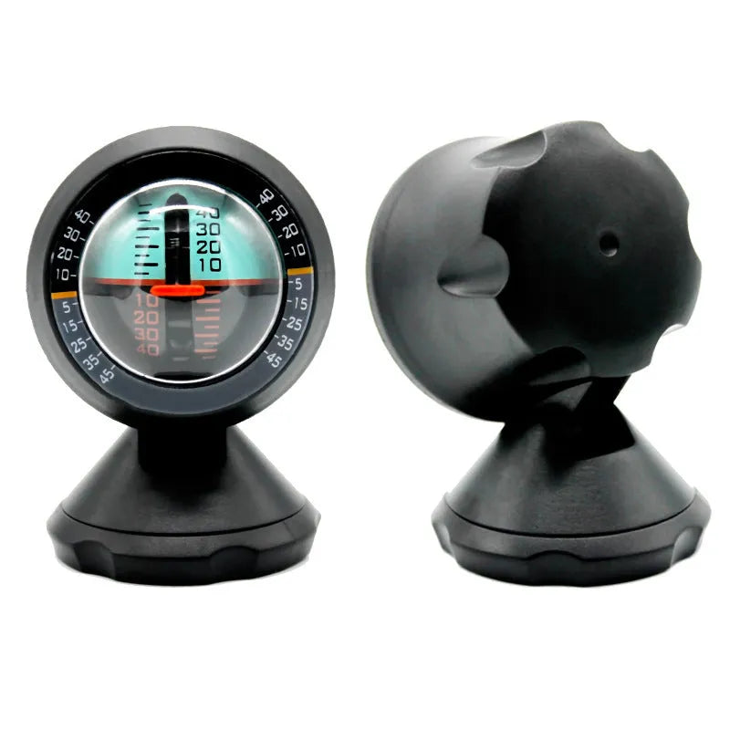 Black vehicle mounted slope meter on dashboard showing inclination measurement
