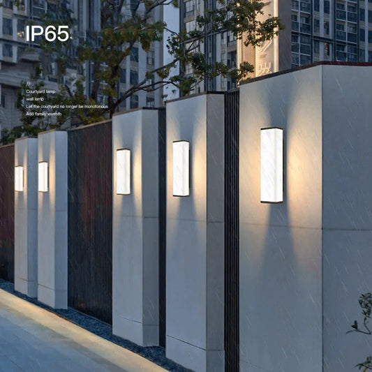 60cm long outdoor wall light with stainless steel housing and LED strip illumination for exterior spaces