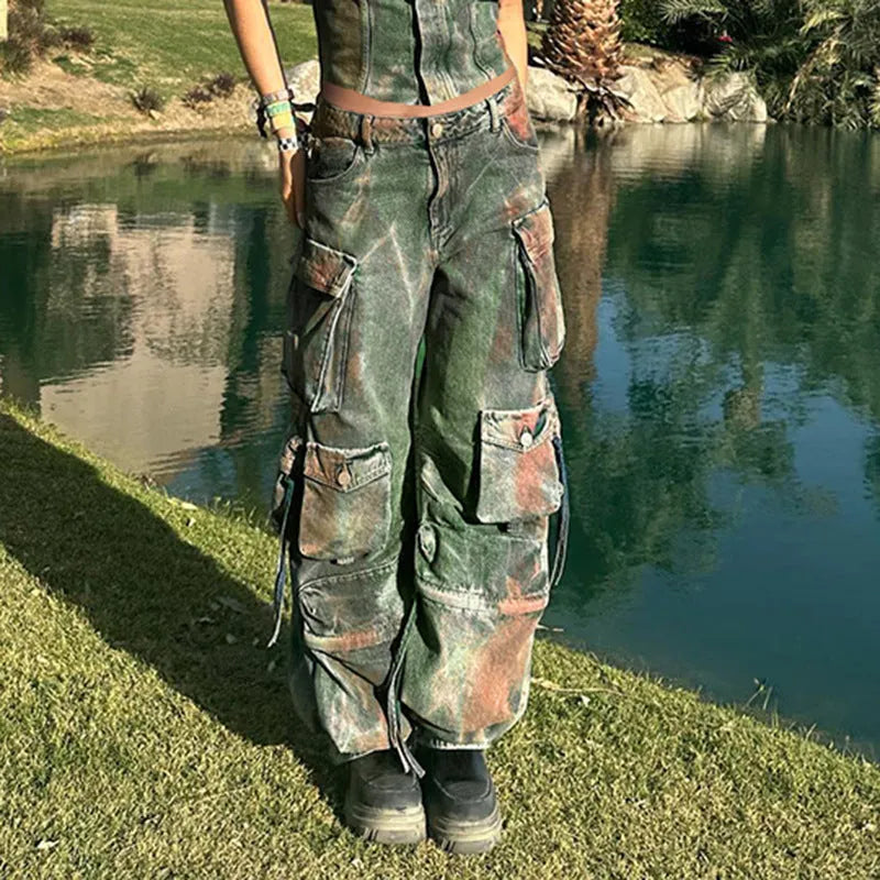 Loose fit multi-pocket cargo denim trousers with gradient colour panels on the pockets.