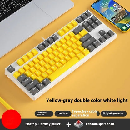 87-key mechanical keyboard with two-tone coloured keycaps on metal case