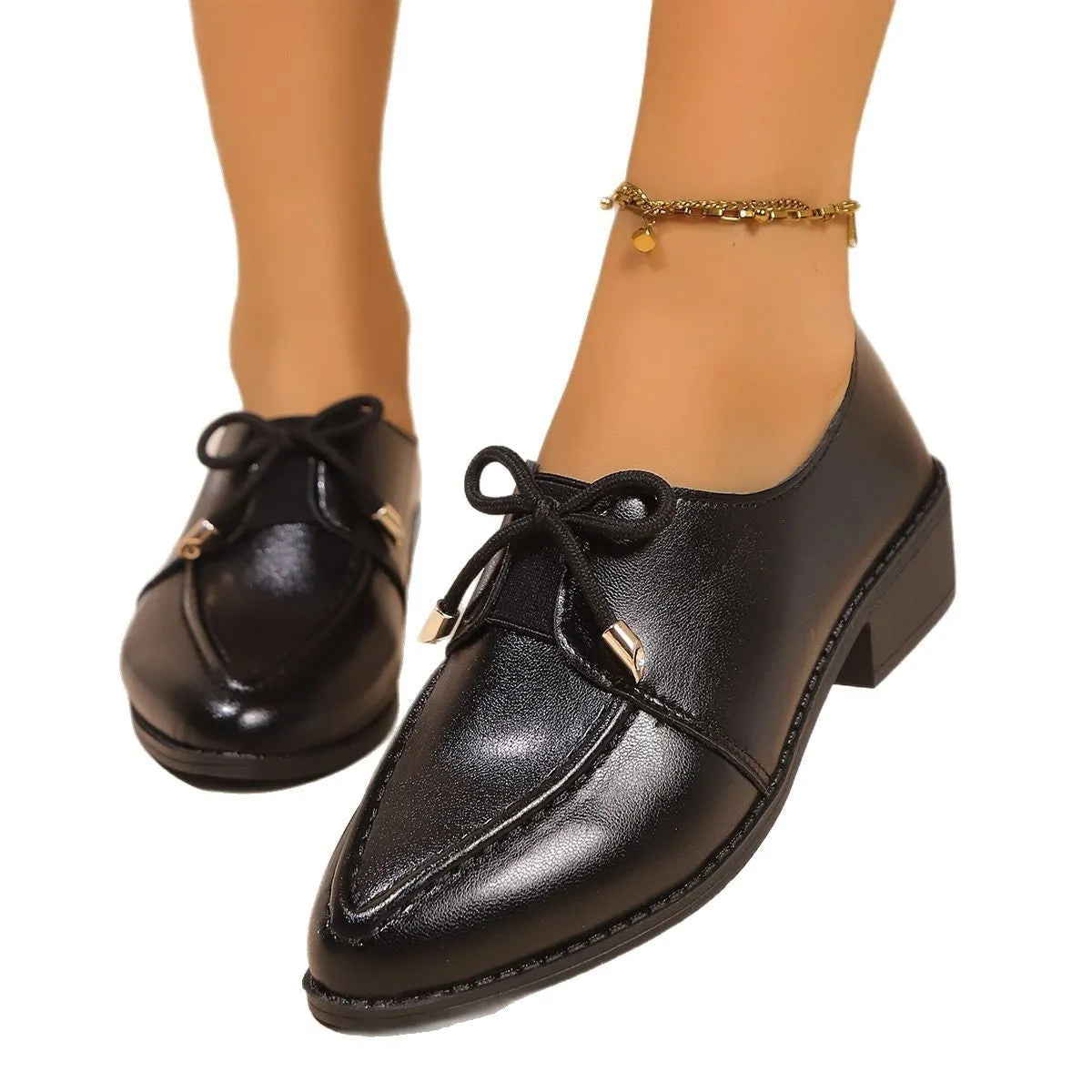 Women's British-style shoes with bow decoration, PU upper, and rubber sole in available sizes 36-43