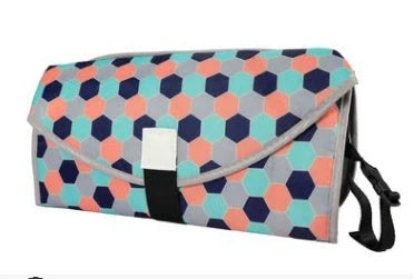 Portable and Waterproof Baby Changing Pad in various color designs, featuring a compact folded size and generous expanded size for comfortable diaper changes