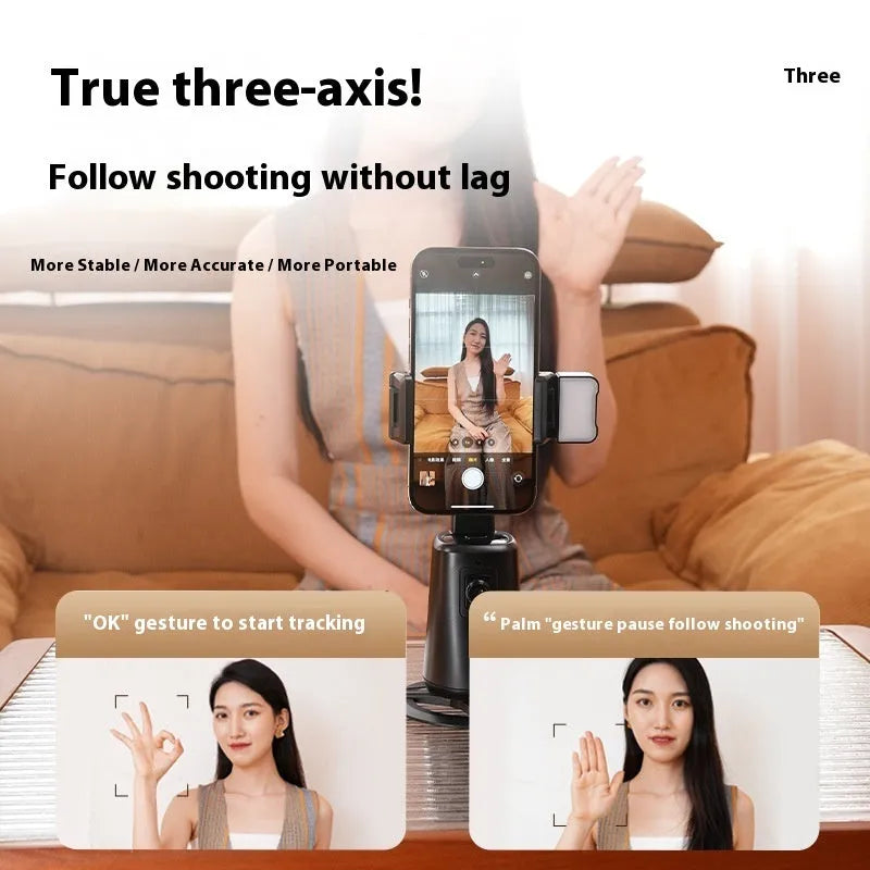 Black desktop phone holder with intelligent face tracking, rotating camera head, and ribbon LED lighting