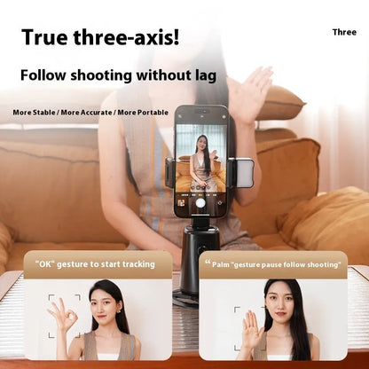 Black desktop phone holder with intelligent face tracking, rotating camera head, and ribbon LED lighting