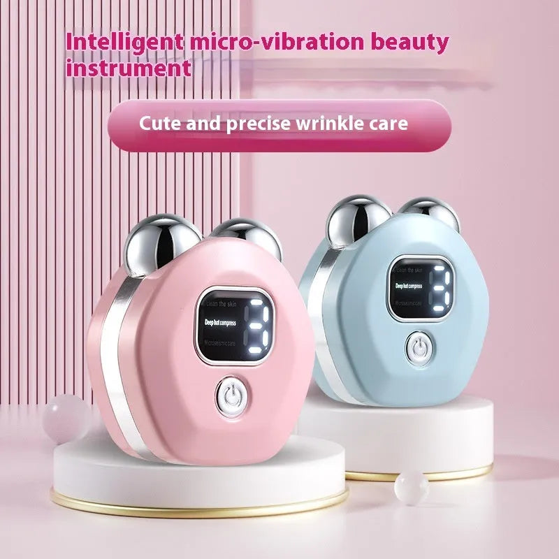 White portable micro current massage instrument with double-roller design and hot compress function for skin rejuvenation