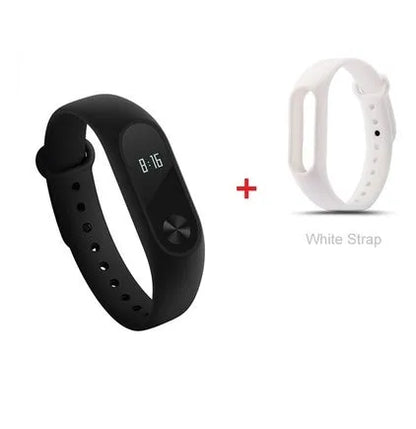 Xiaomi Mi Band 2 black fitness tracker with OLED display showing heart rate and time on adjustable wrist strap