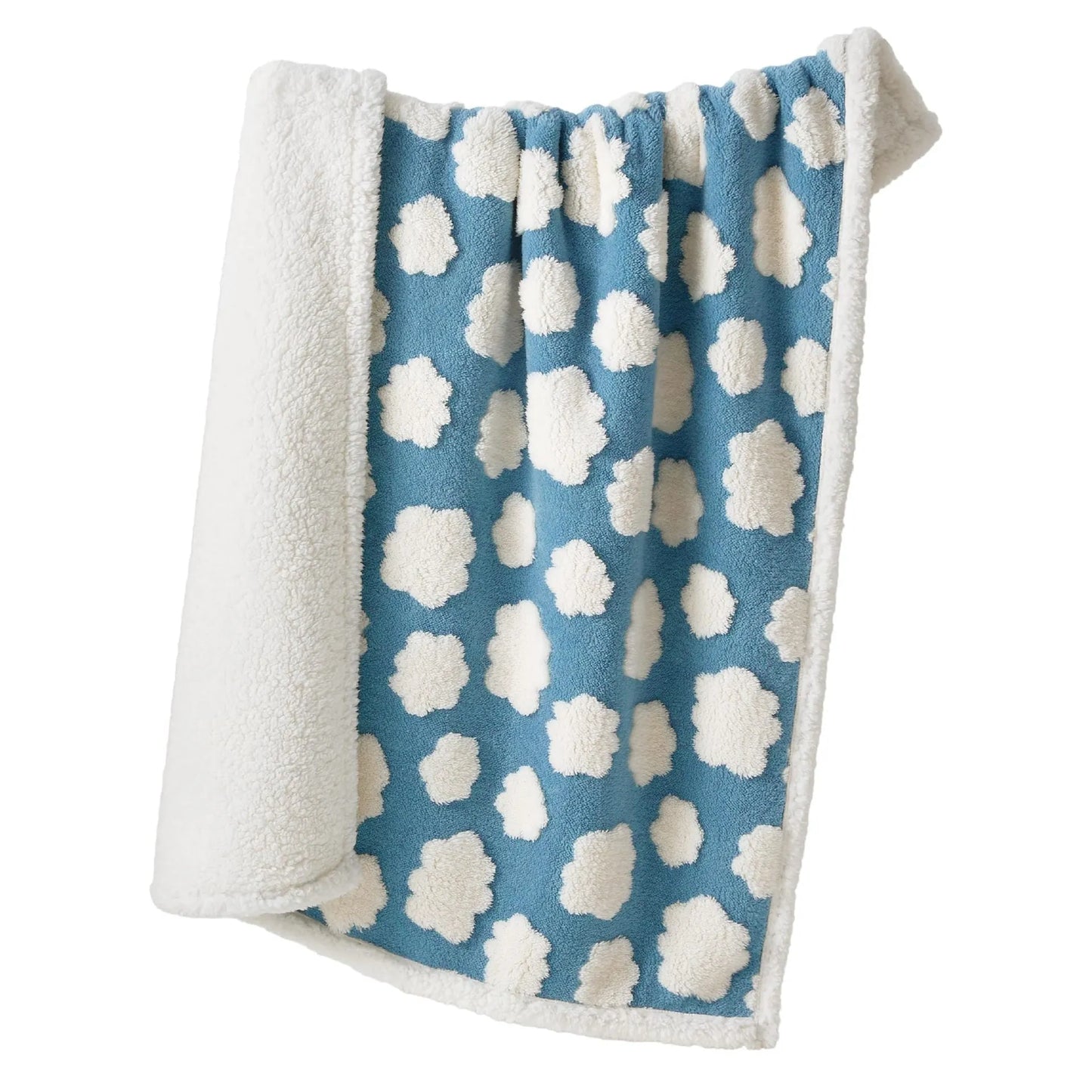 Blue and white patterned waterproof dog blanket on furniture showing cloth texture