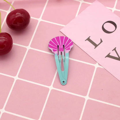 Colourful metal hair barrettes for children with printed watermelon, strawberry, pineapple and Christmas designs.