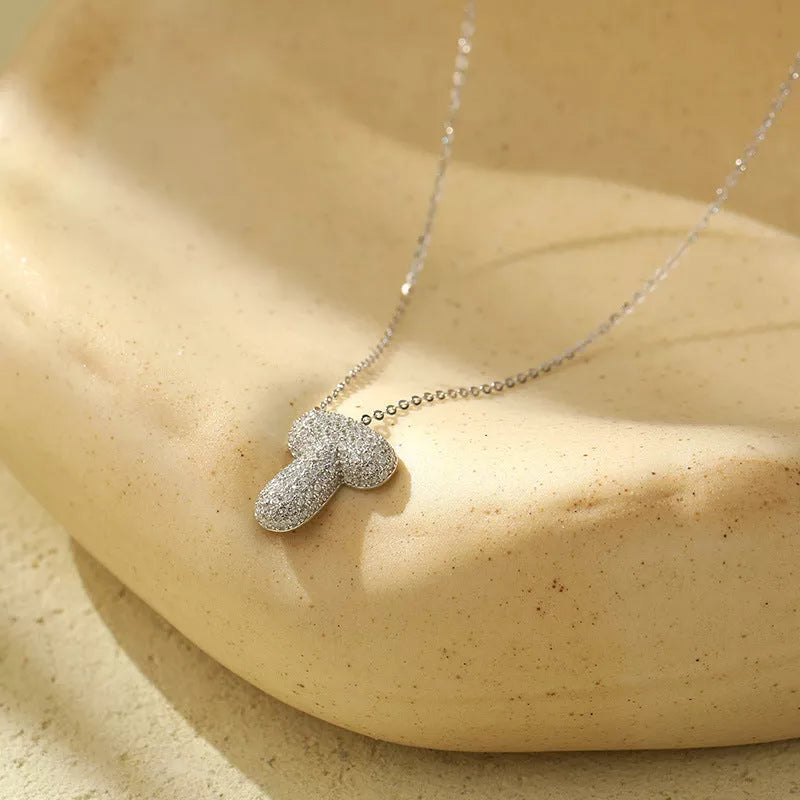 Stainless steel initial pendant necklace with zircon accents, personalized with your choice of letter.
