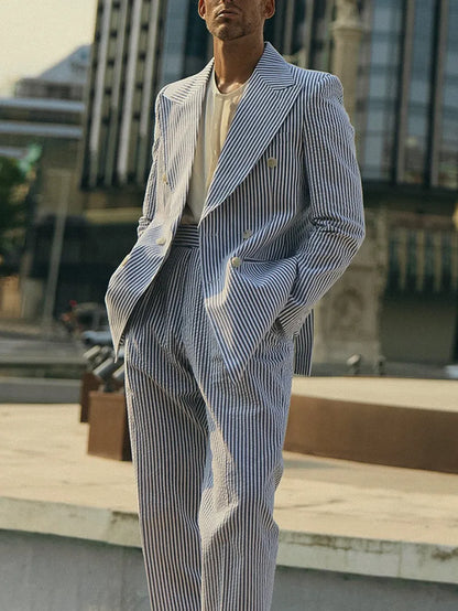 Blue and white striped polyester suit set with blazer and pants on mannequin