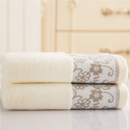 Wisteria flower jacquard cotton towel showing textured surface and 34x73 cm dimensions