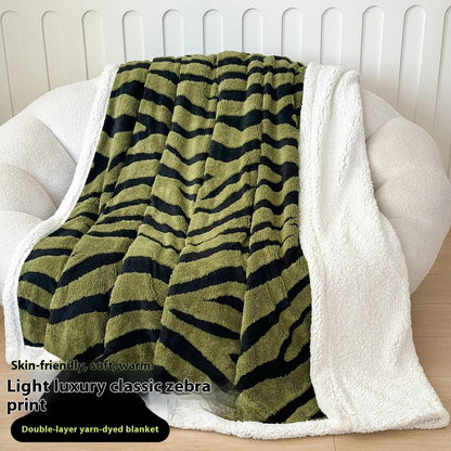 Double-layer cationic leopard jacquard taffeta blanket showing raised animal print pattern in available colour options