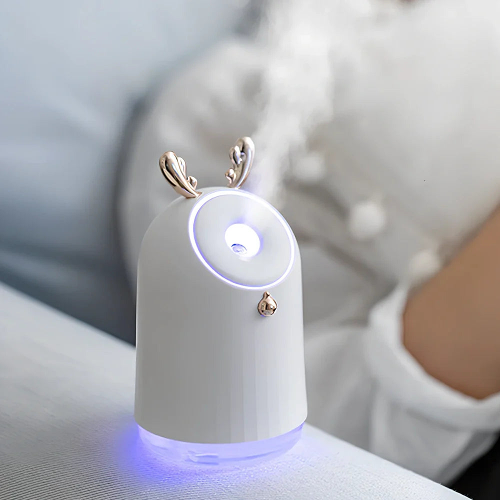 Blue humidifier table lamp with USB port, 80mm diameter, mist output and ambient lighting functions